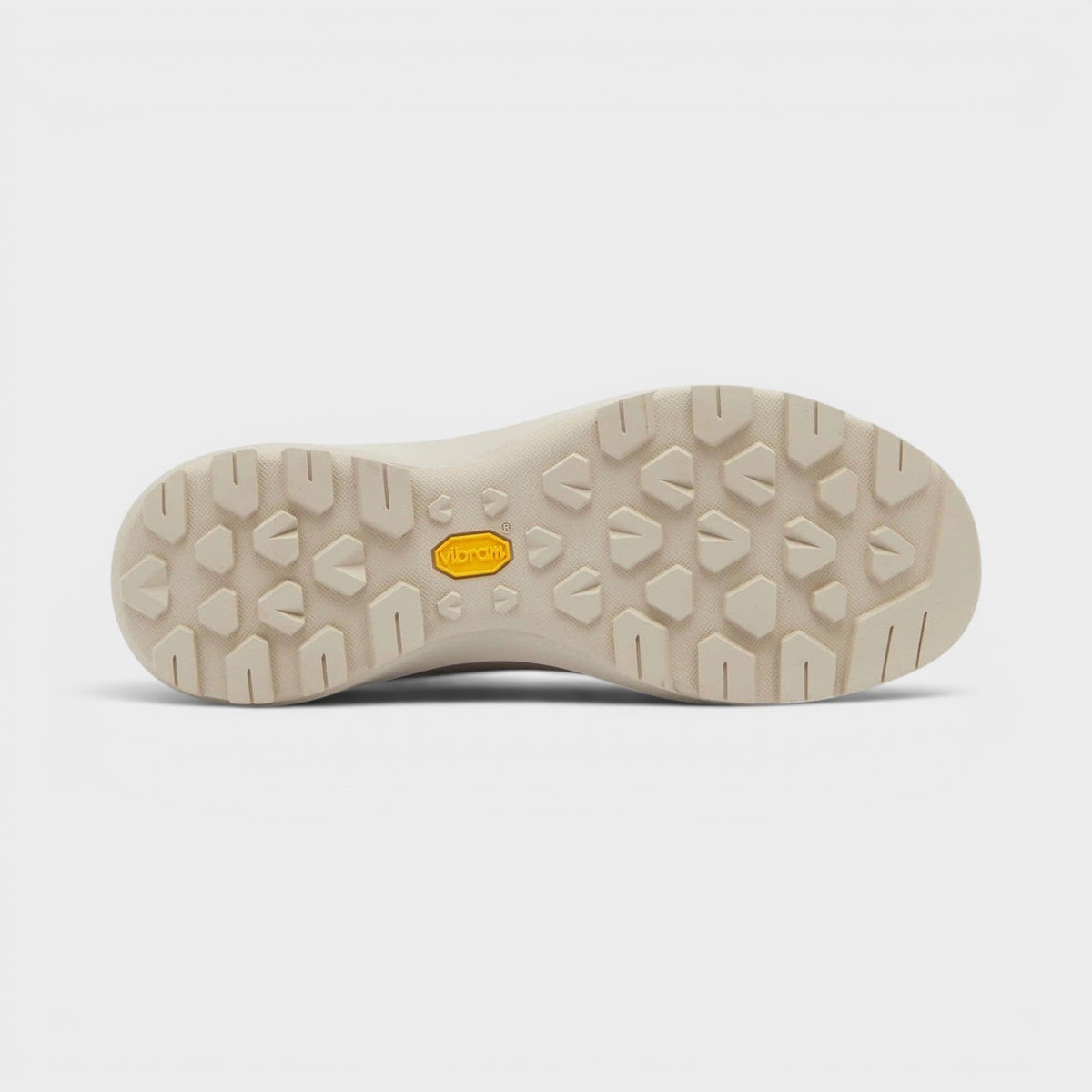 Shoe outsole with rugged tread and yellow logo patch, beige rubber, UK8.5.