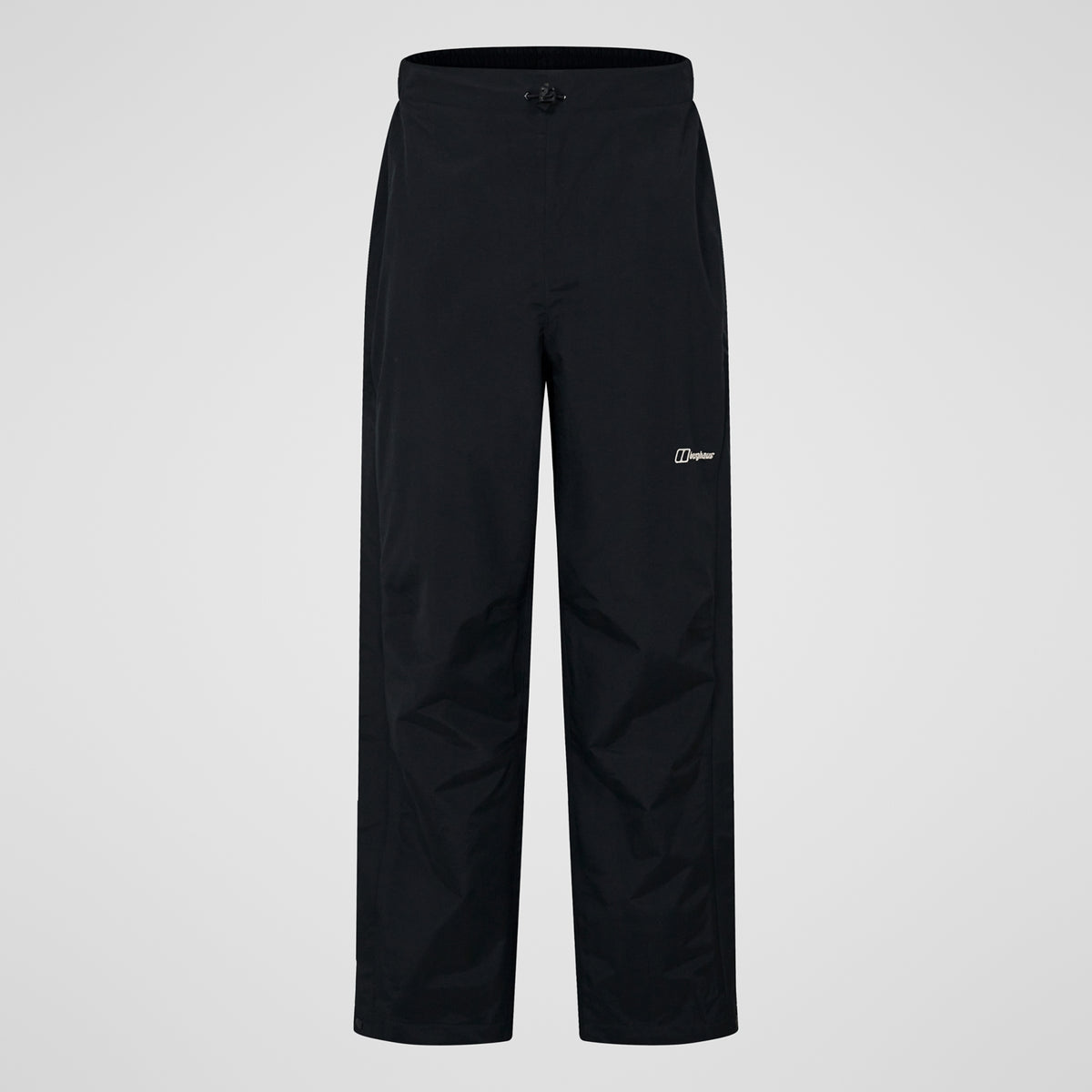 Black waterproof overtrousers with elastic waistband and stitched panel seams