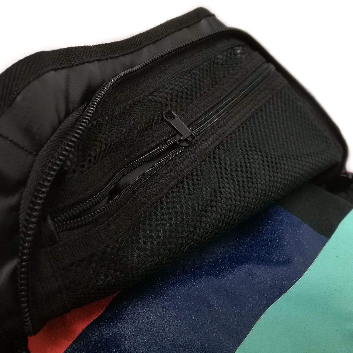 Duffel bag side pocket with zipper and mesh fabric showing blue lining