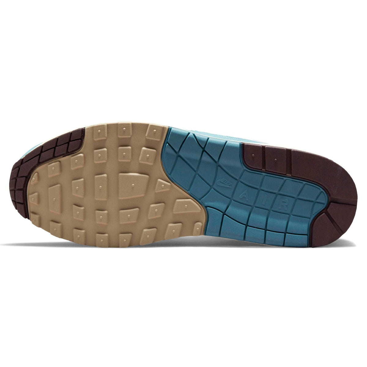 Outsole of white and aqua Nike Air Max 1 trainers with tread and blue grid section