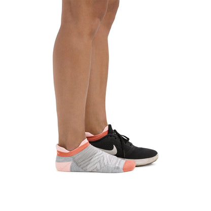 No-show running merino socks on black shoes, heather gray with coral trim