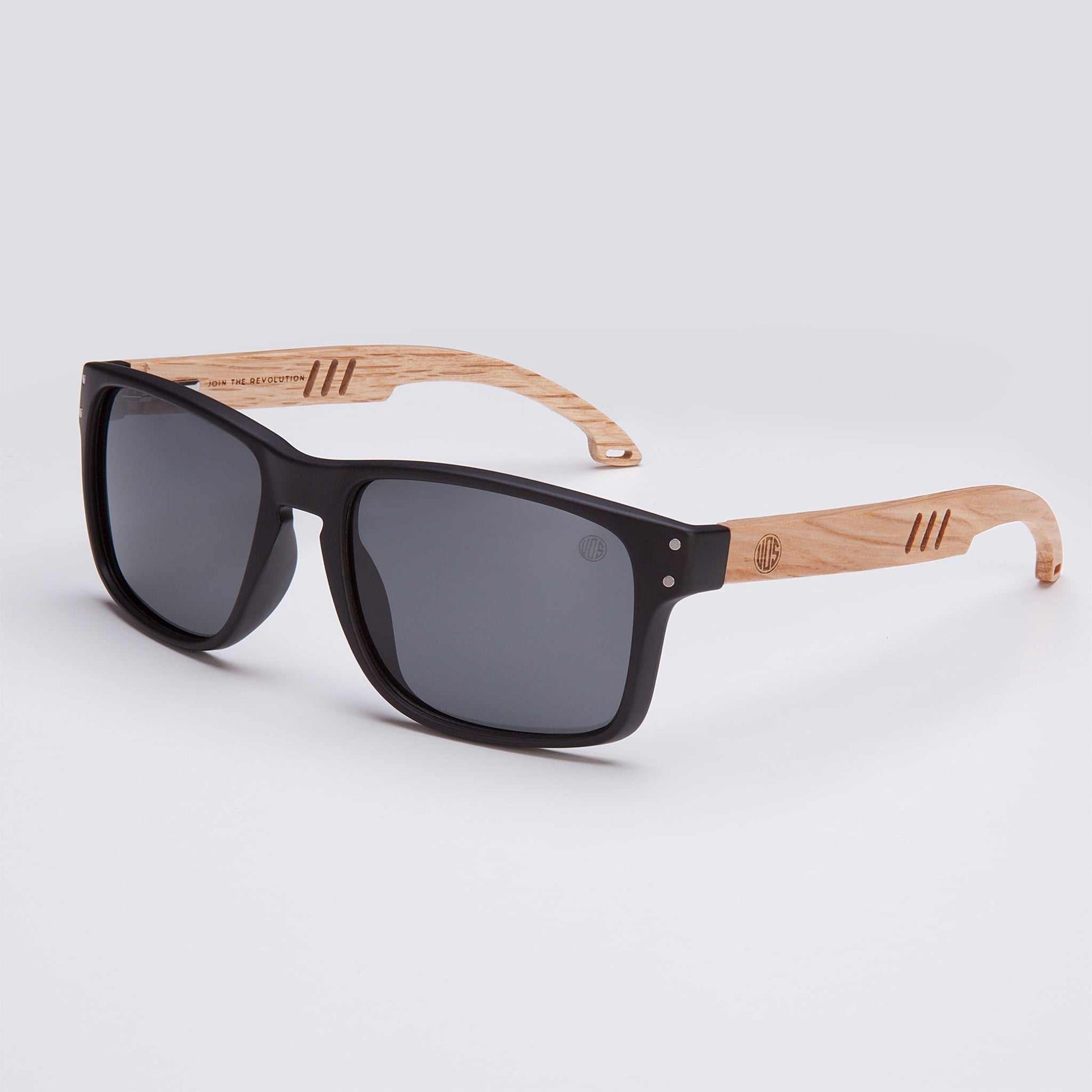 Men’s polarized sunglasses with real wood arms, black frames and dark lenses.