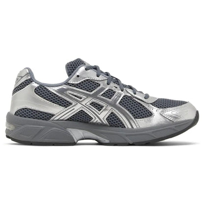 ASICS GEL-1130 lace-up trainers with silver overlays and dark mesh upper.