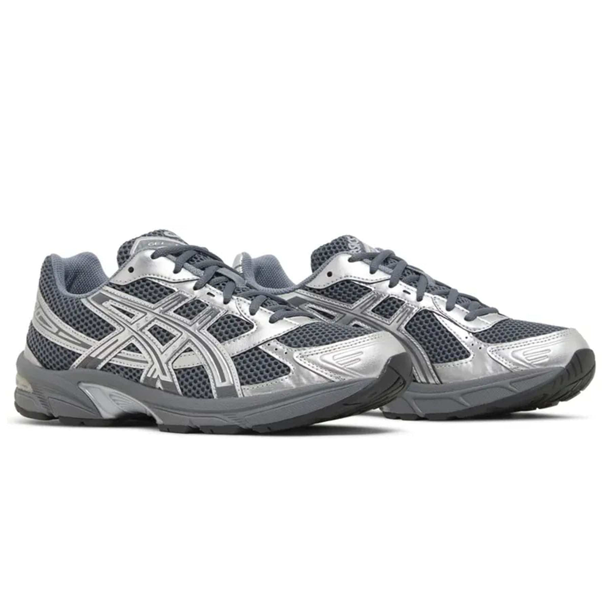 Pair of ASICS GEL-1130 trainers with silver logo stripes and dark mesh quarter panels.