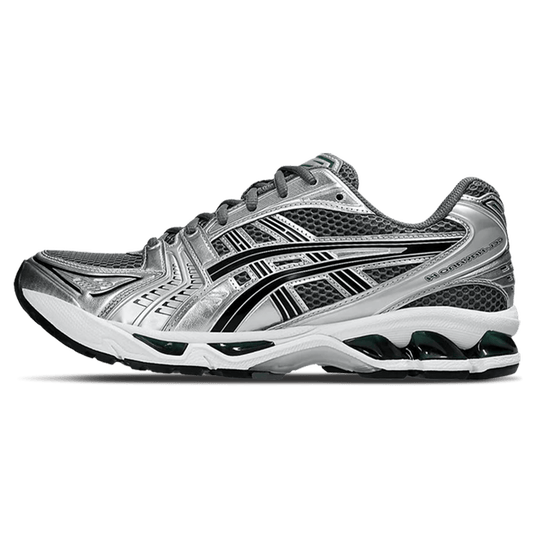 Silver and black running trainers with dark green cushioning sole, lace-up side view