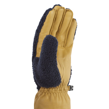 Tan waterproof sherpa fleece hiking glove with navy side panel and cuff buckle detail