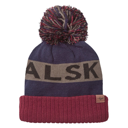 Navy knit bobble hat with beige stripe reading "ALSK" and a tan leather logo patch