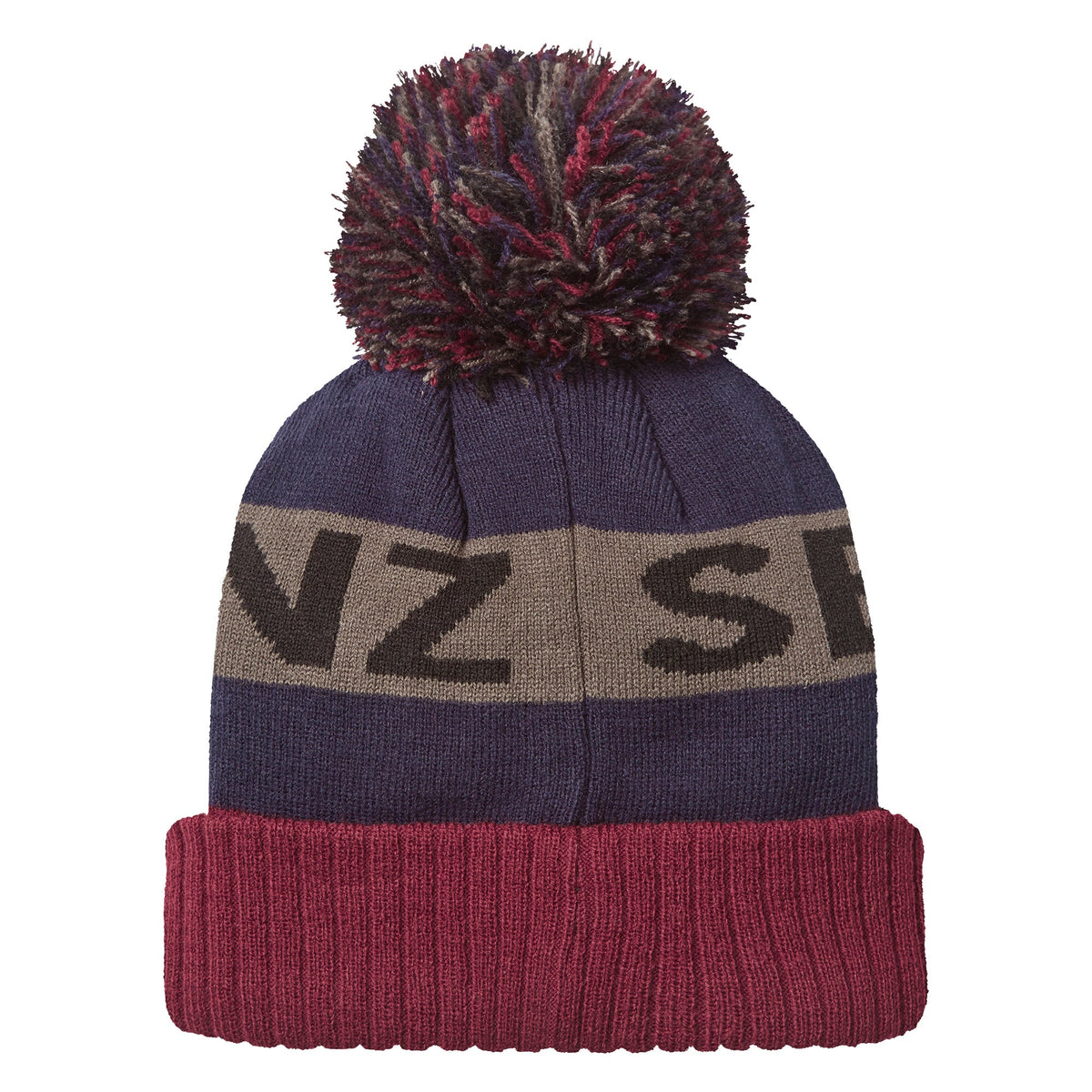 Navy knit beanie with burgundy cuff, grey bobble, and stripe reading "NZ S" plus leather patch