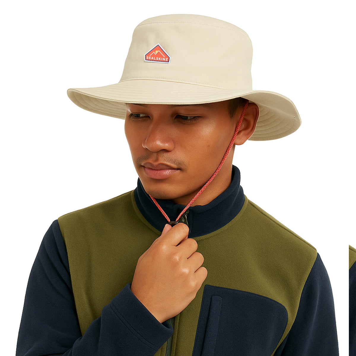 Stone boonie hat worn by model, red chin cord with toggle, wide brim