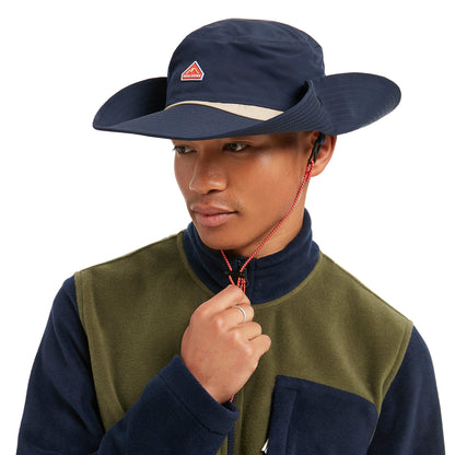 Navy boonie hat worn by model, red chin cord with toggle, wide brim