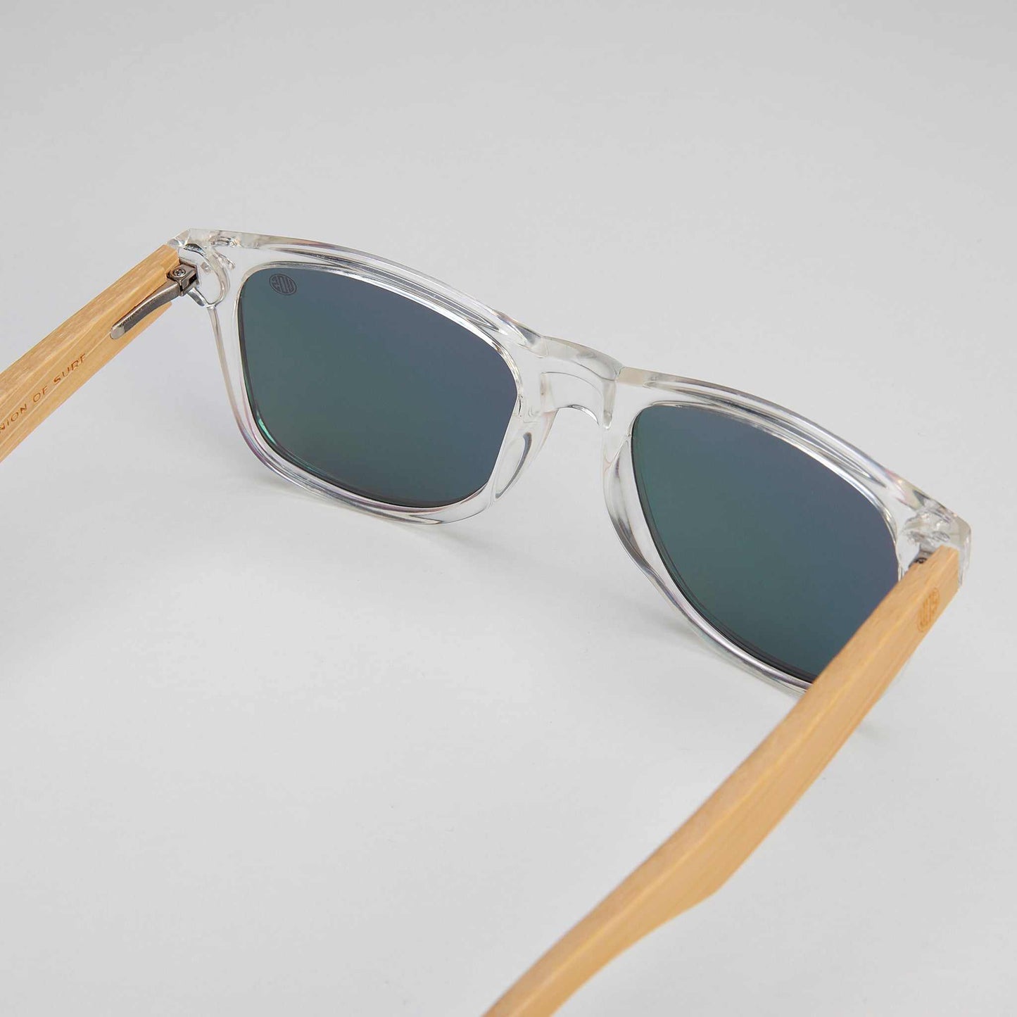Clear sunglasses with dark lenses and bamboo-look temple arms