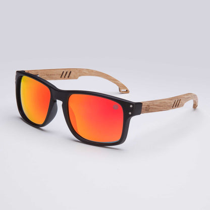 Men’s polarized sunglasses with real wood arms, black frames and orange mirrored lenses.