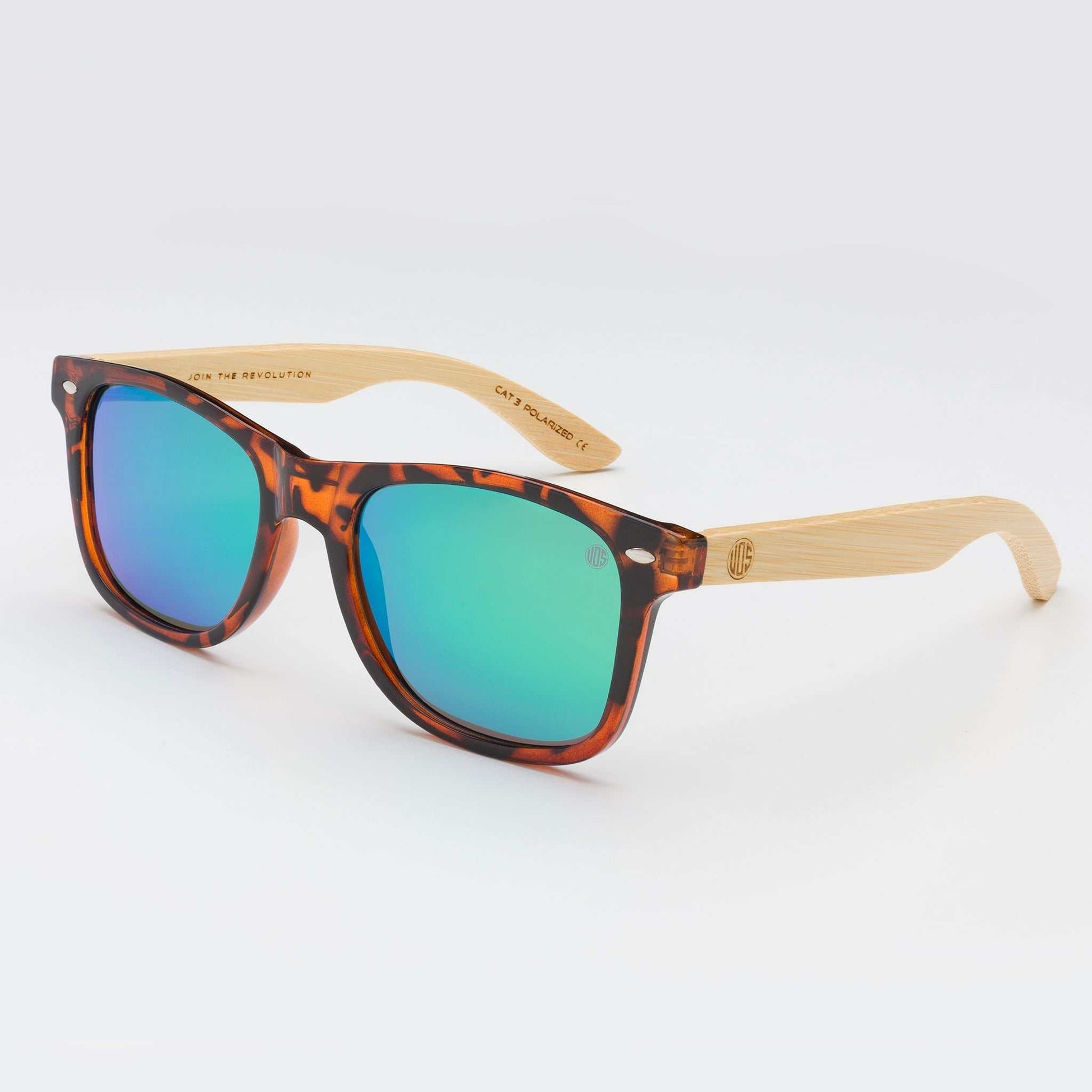 Tortoise acetate sunglasses with teal mirrored lenses and light wood-tone arms