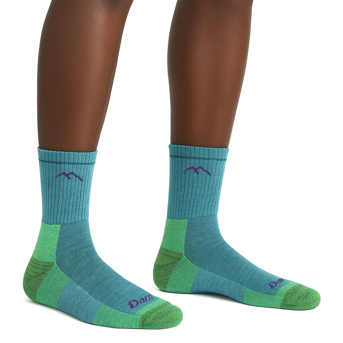 Teal micro crew hiking socks with green panels and mountain logo, pair view