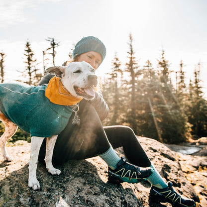 Blue-green micro crew hiking socks under hiking shoes, with cuff pattern
