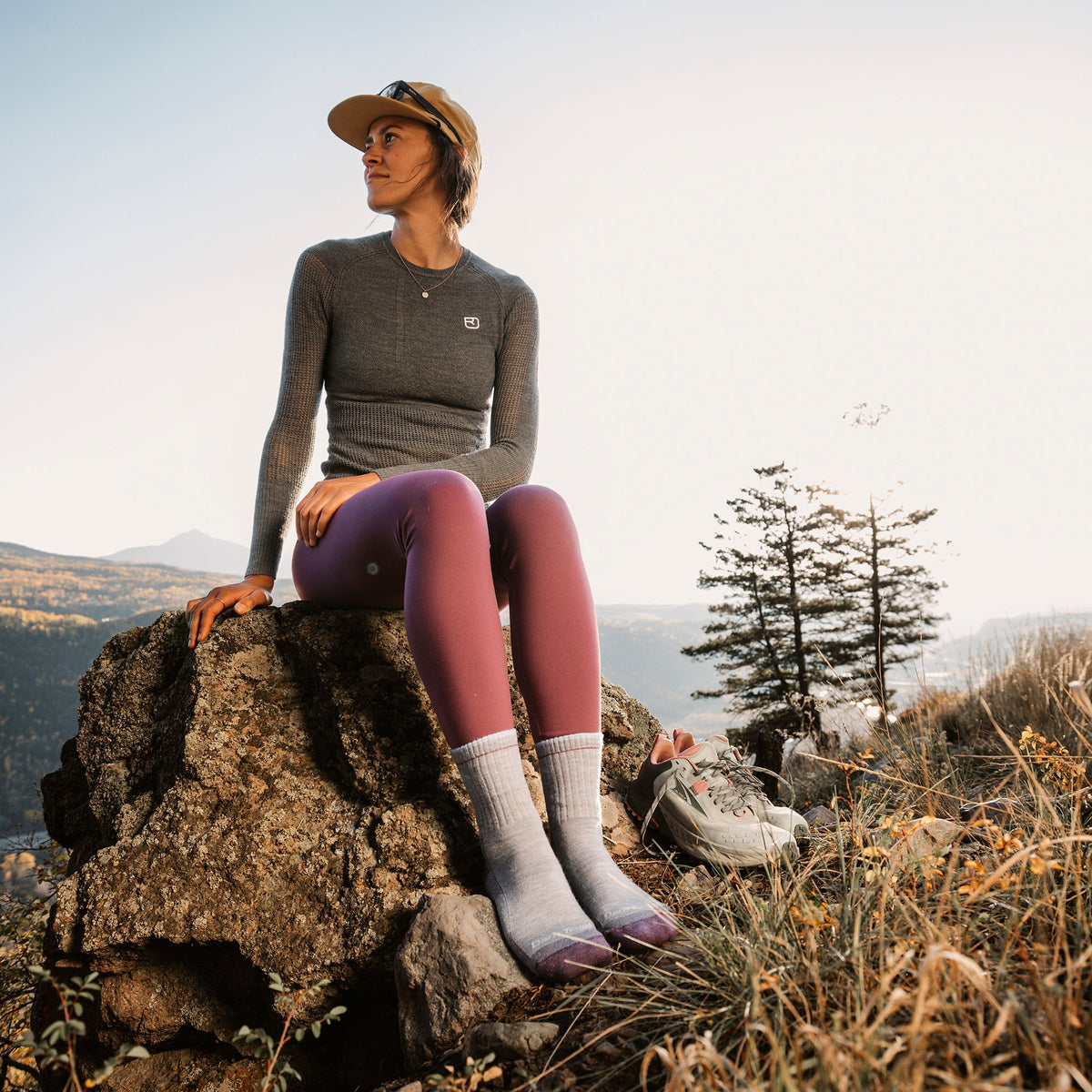 Micro crew hiking socks in light gray with ribbed cuff and cushioned foot