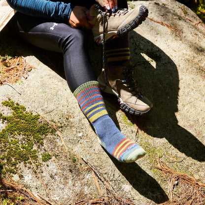 Midweight hiking merino wool socks in indigo blue with rainbow stripe bands