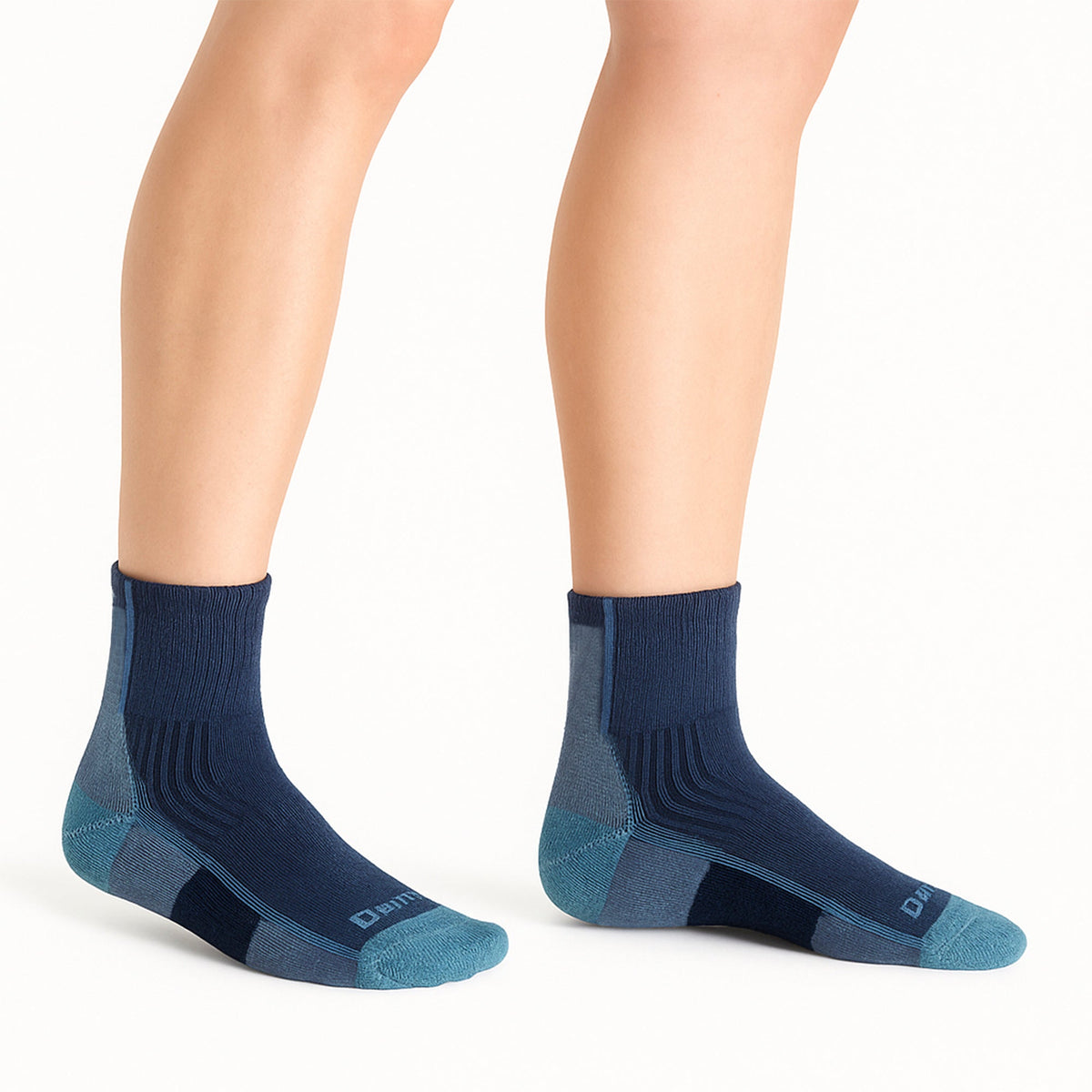 Pair of blue merino ankle hiking socks with seamless knit and arch support