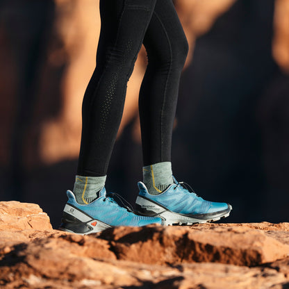Blue merino ankle hiking socks with seamless knit and yellow contrast lines