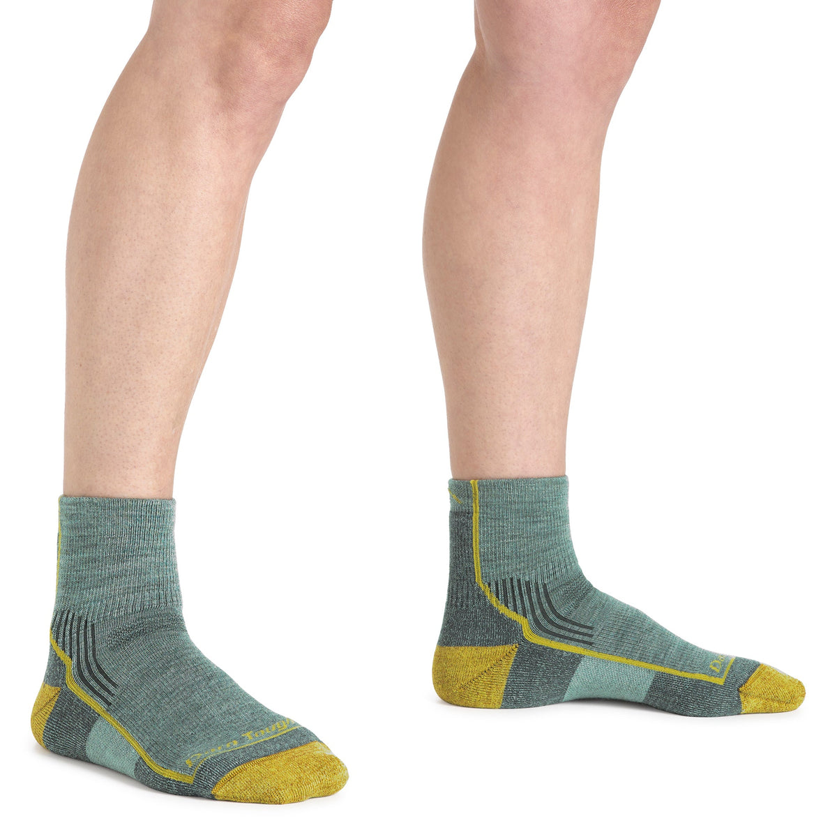 Pair of sage merino ankle hiking socks with seamless knit and yellow contrast stripes