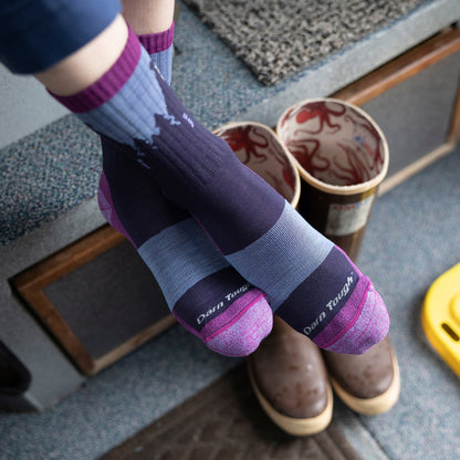 Ladies merino hiking crew socks in blue-gray and dark navy with bear motif and purple toe