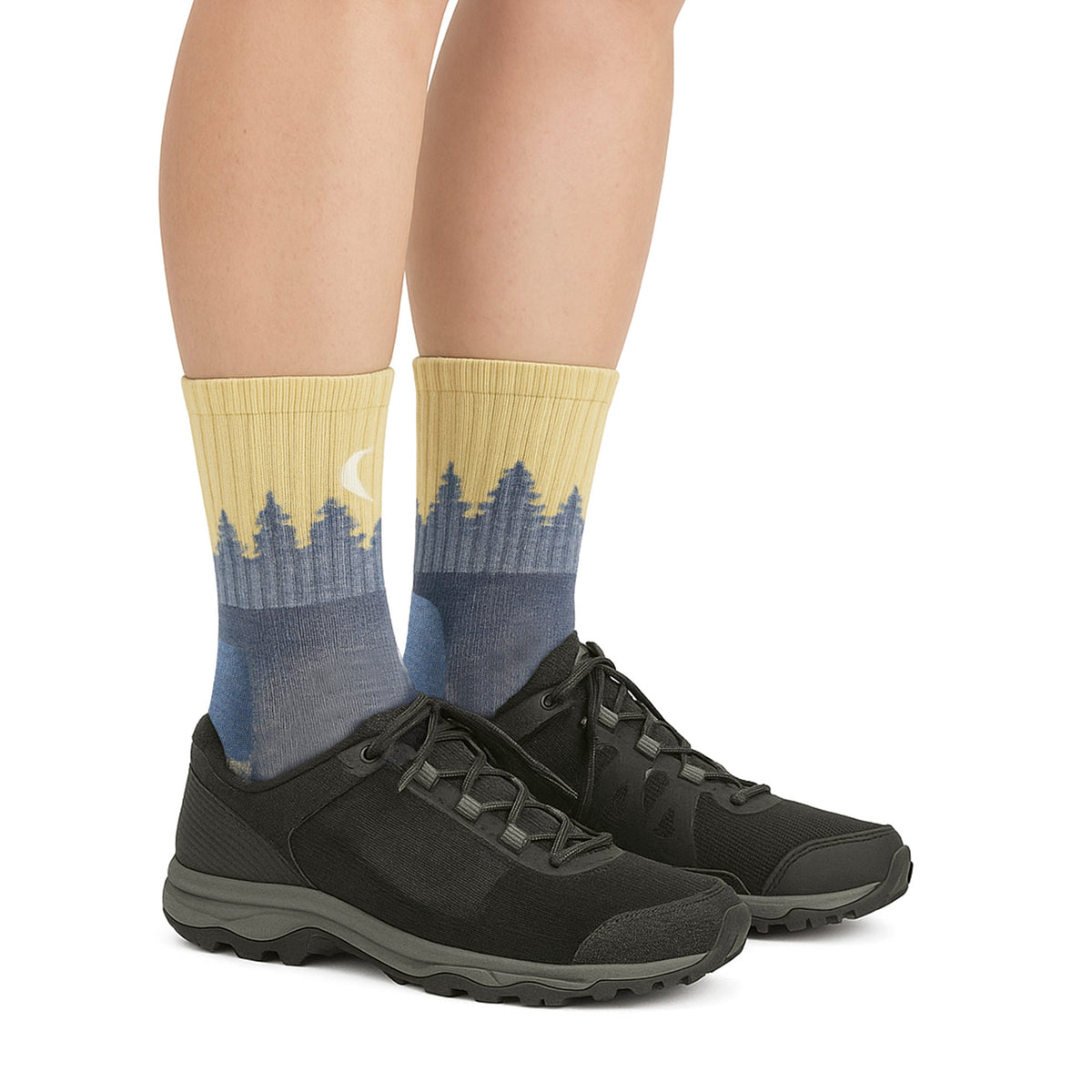 Ladies crew hiking socks in oatmeal/navy worn with black hiking shoes.