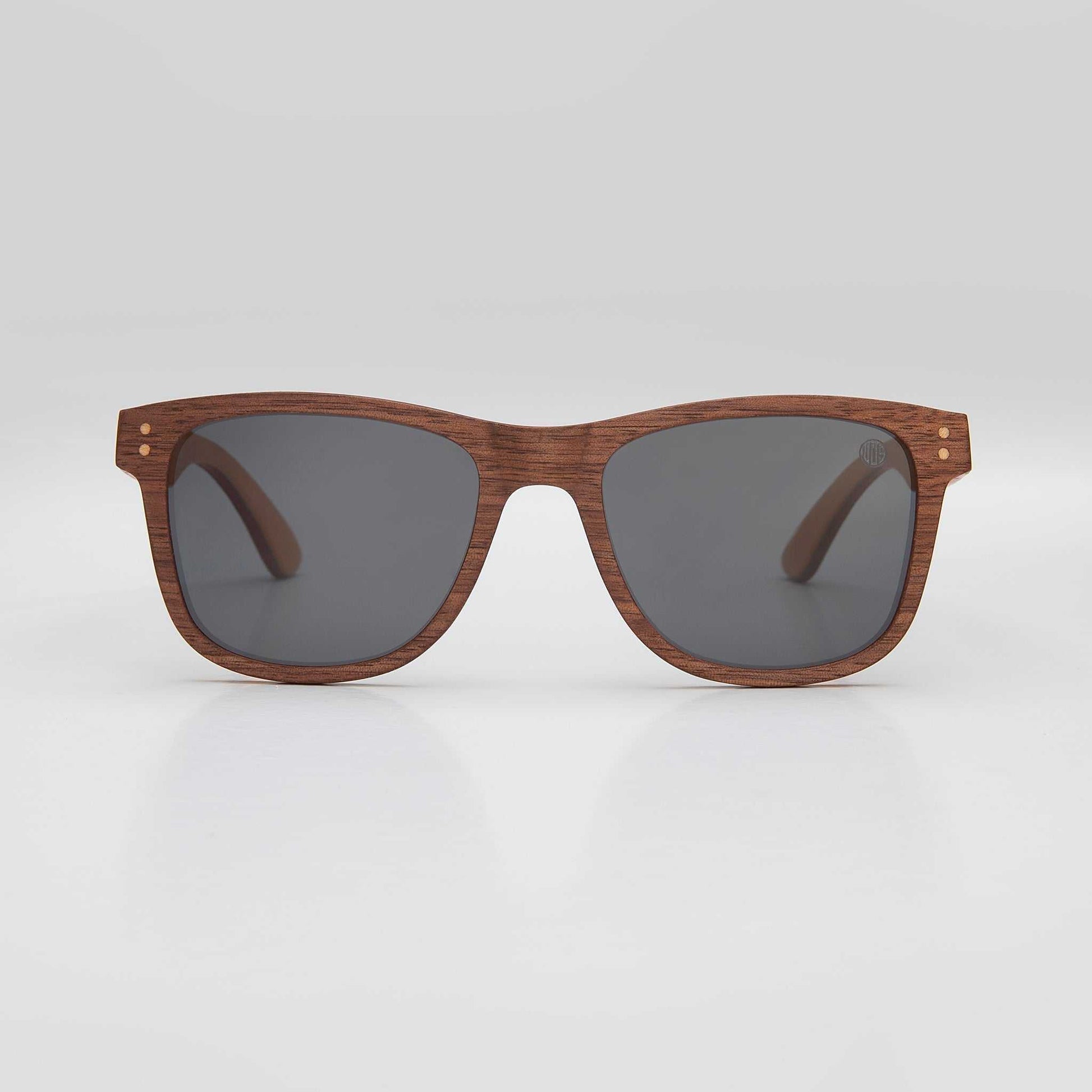 Wood-look wayfarer sunglasses with polarized dark gray lenses and brown double-bridge frame