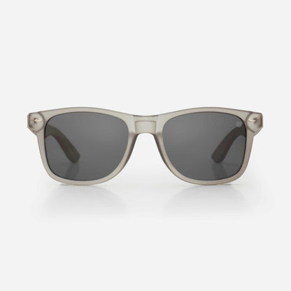 Cream/ivory sunglasses with dark gray lenses and small metal rivets on temples