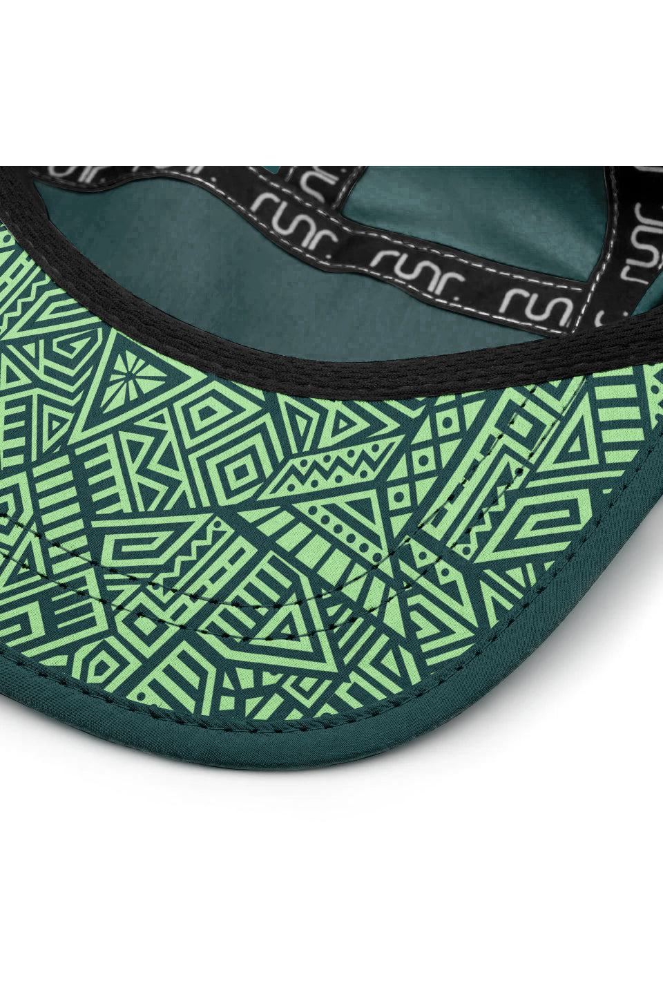 Dark green cap brim detail with geometric underside lining and stitched edge