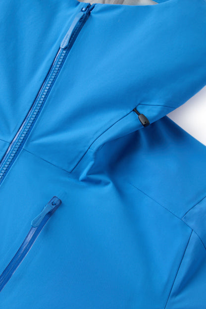 Hooded shell jacket front seams with zipper details and drawcord toggles