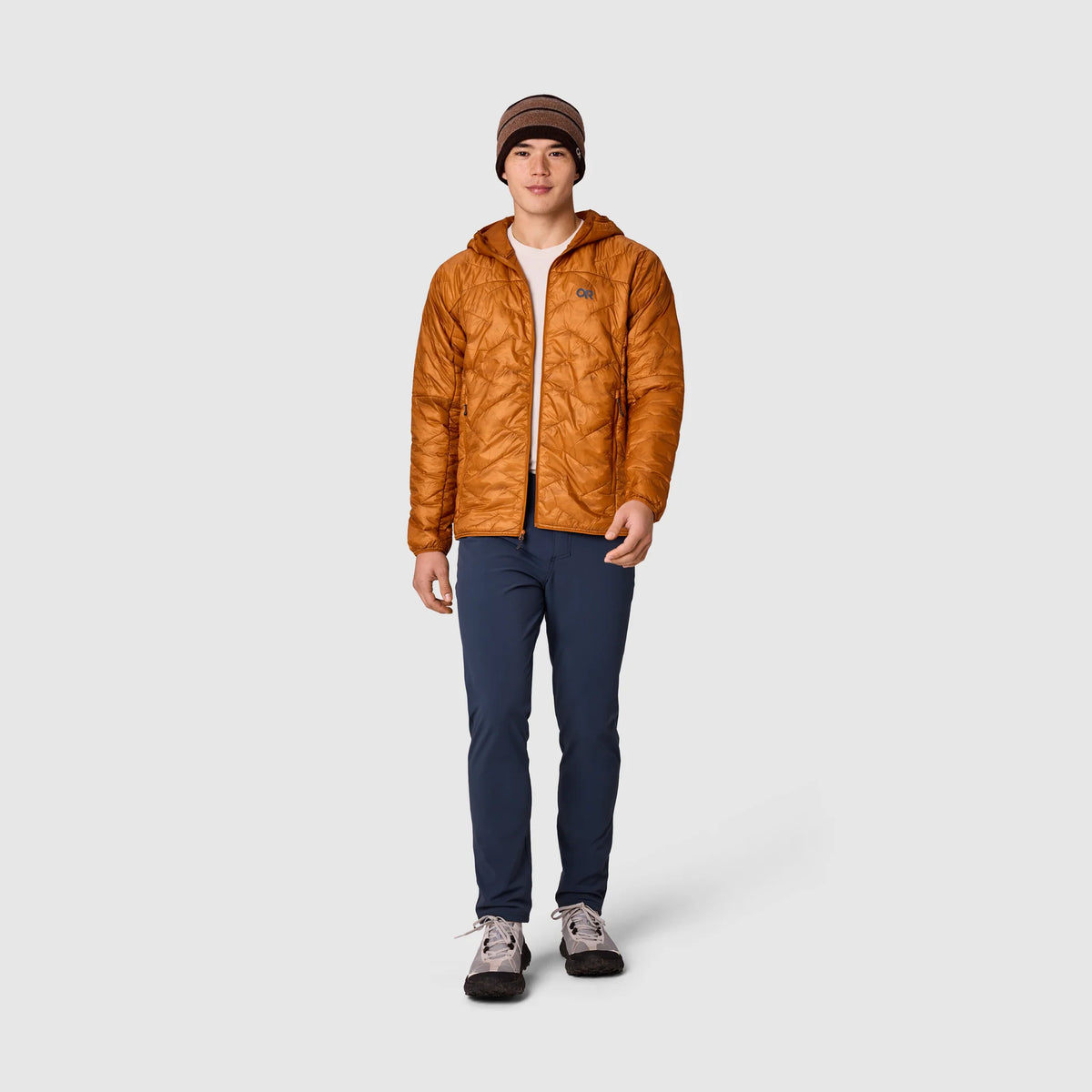Men's orange insulated hoodie jacket with hood and full zipper, navy pants