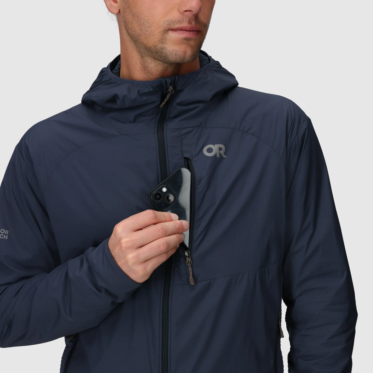 Navy hoodie with a zippered chest pocket sized for a phone