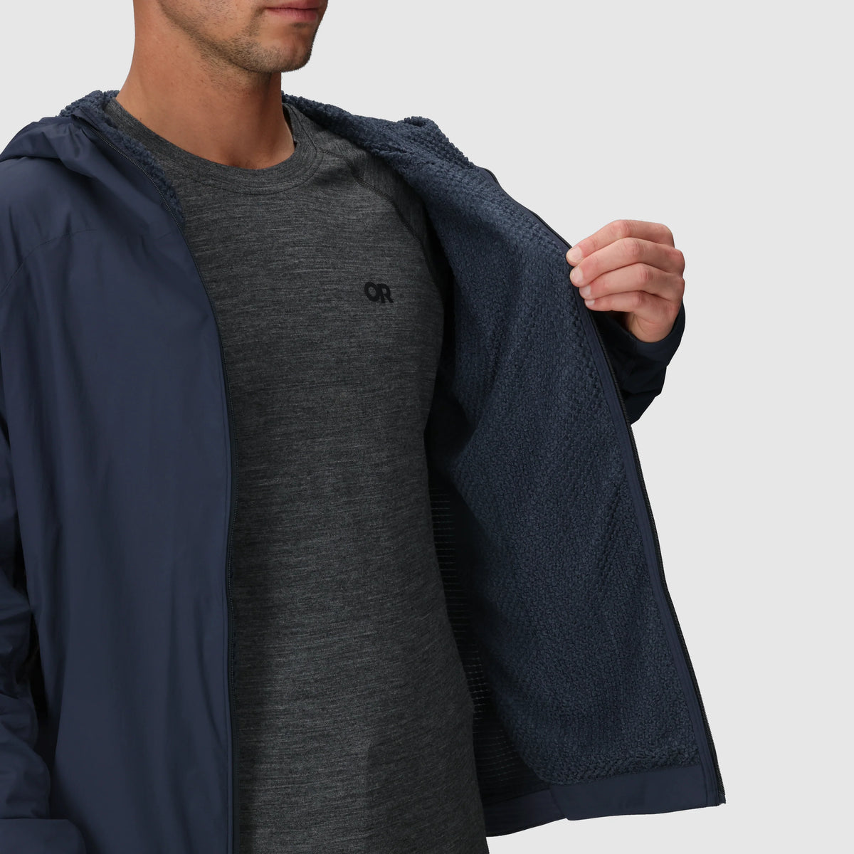 Navy hoodie opened to show its textured insulated lining