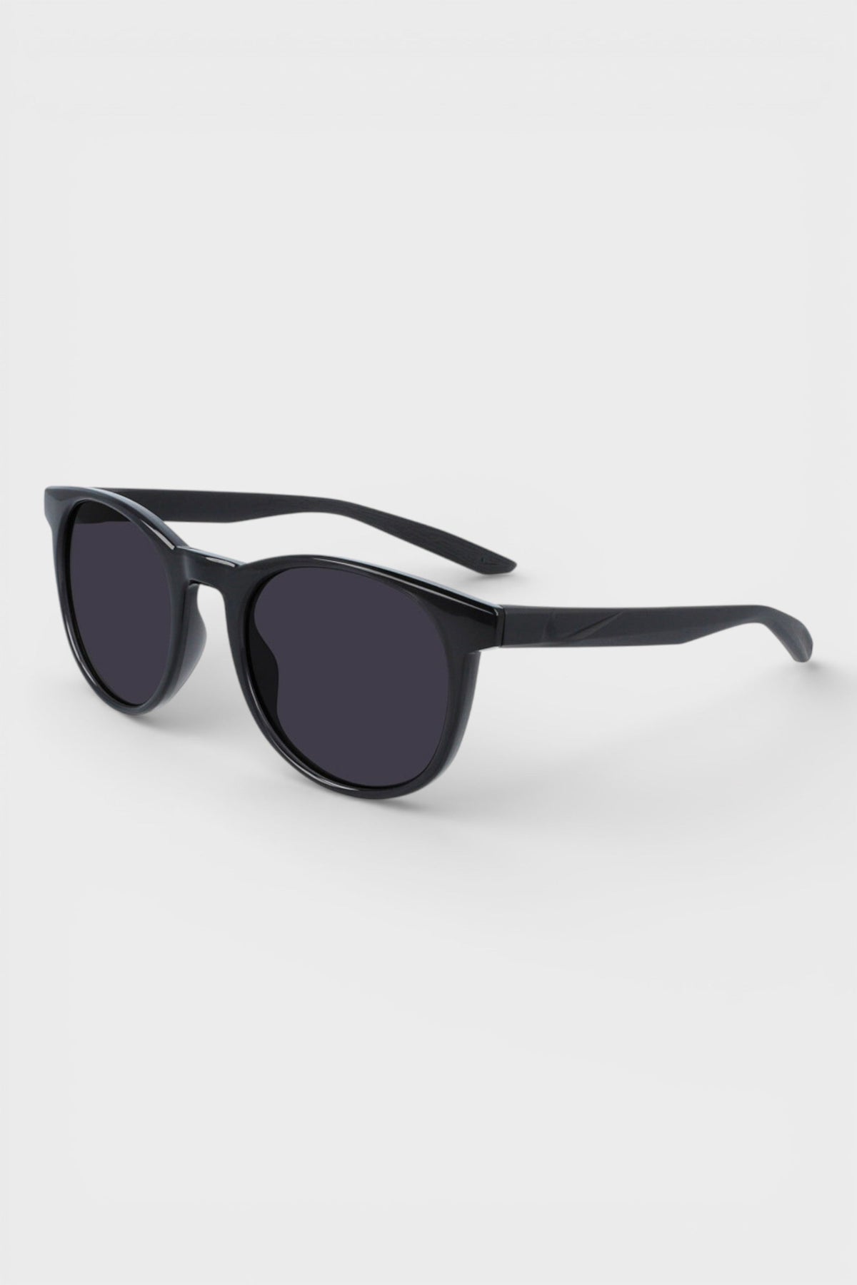 Nike sunglasses with dark lenses and black frame, wide side view