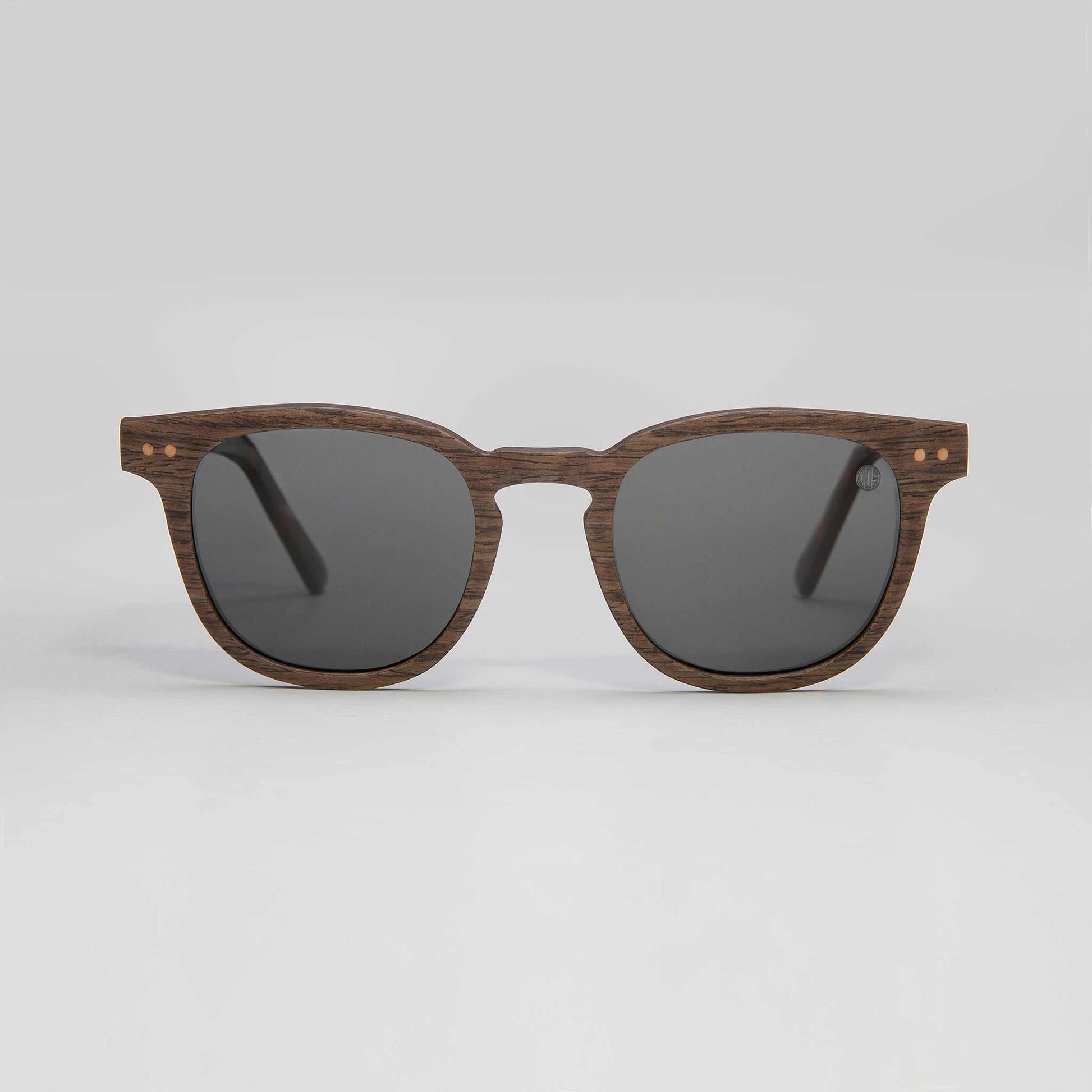 Walnut sunglasses with dark round lenses and tortoise-style temples
