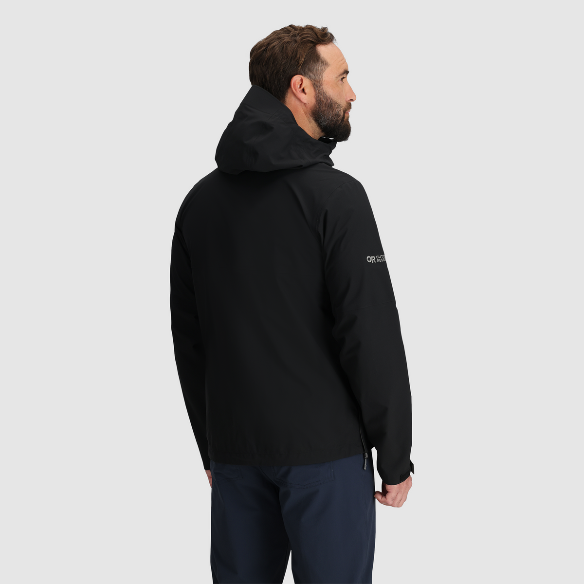 Men's black waterproof shell jacket with hood and full front zipper, side logo detail