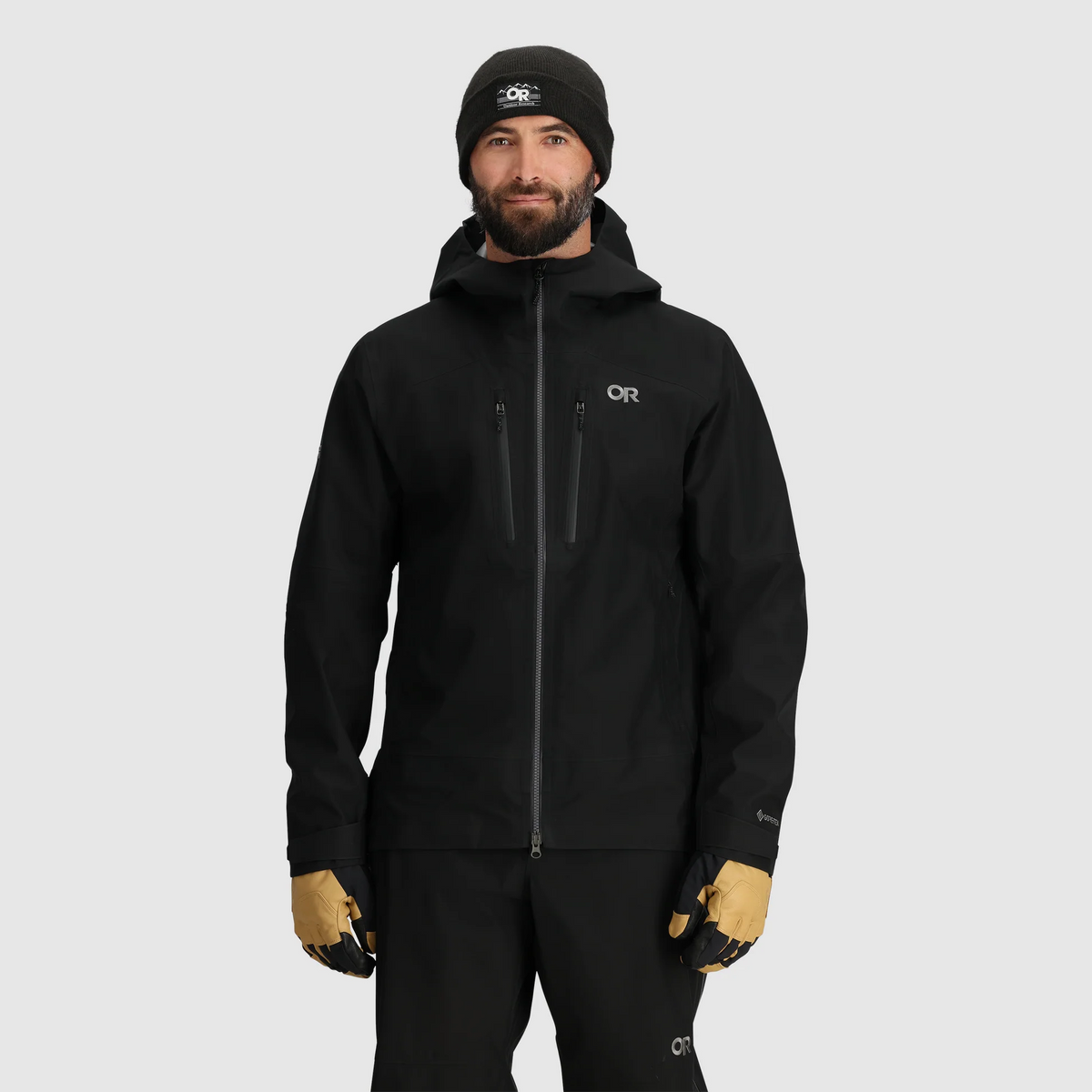 Men's black GORE-TEX 3L shell jacket with structured hood and zip front