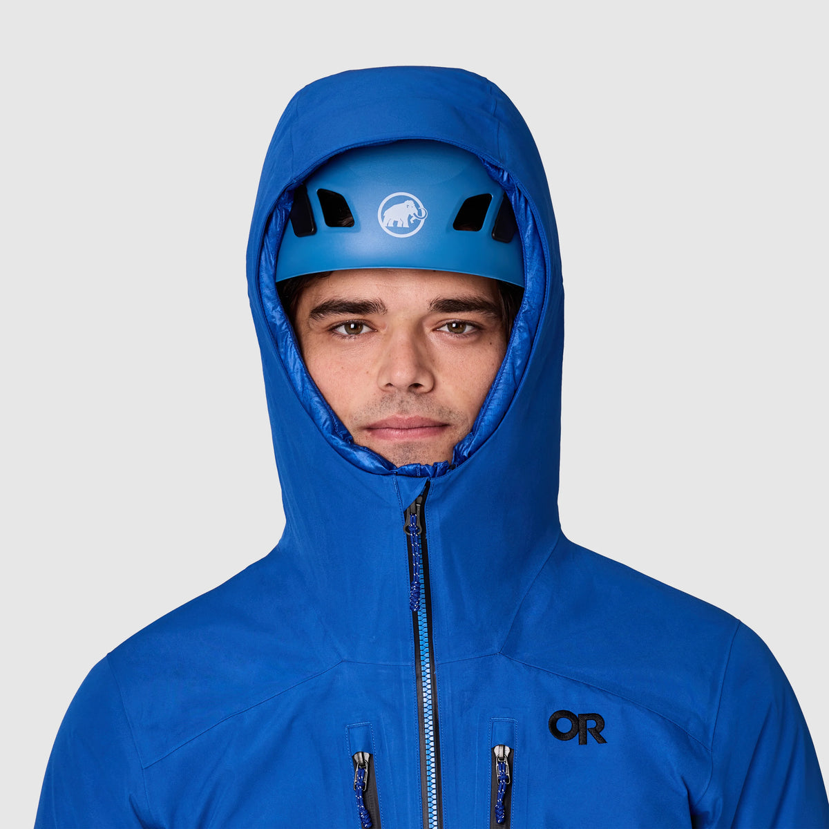 Men's blue hooded GORE-TEX jacket with zip front and OR chest logo