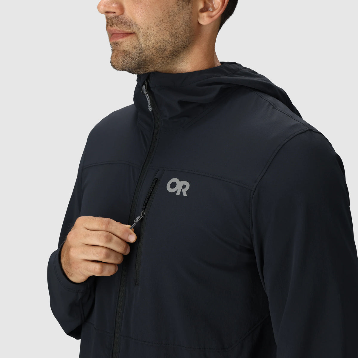 Men's dark softshell jacket with a chest zip pocket and full-length front zipper