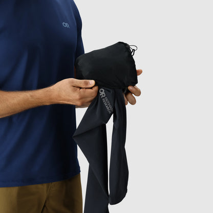 Men's softshell jacket packed into a compact bundle