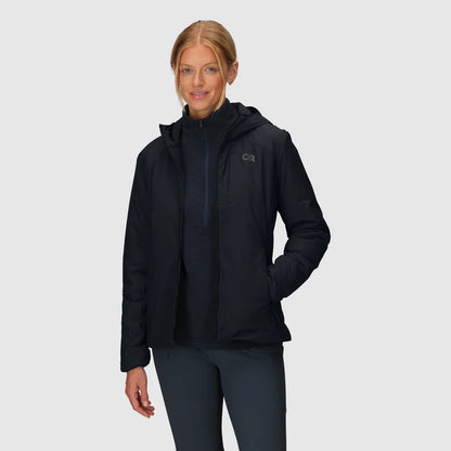 Women's black insulated hoodie worn open over a dark top, with hand in side pocket