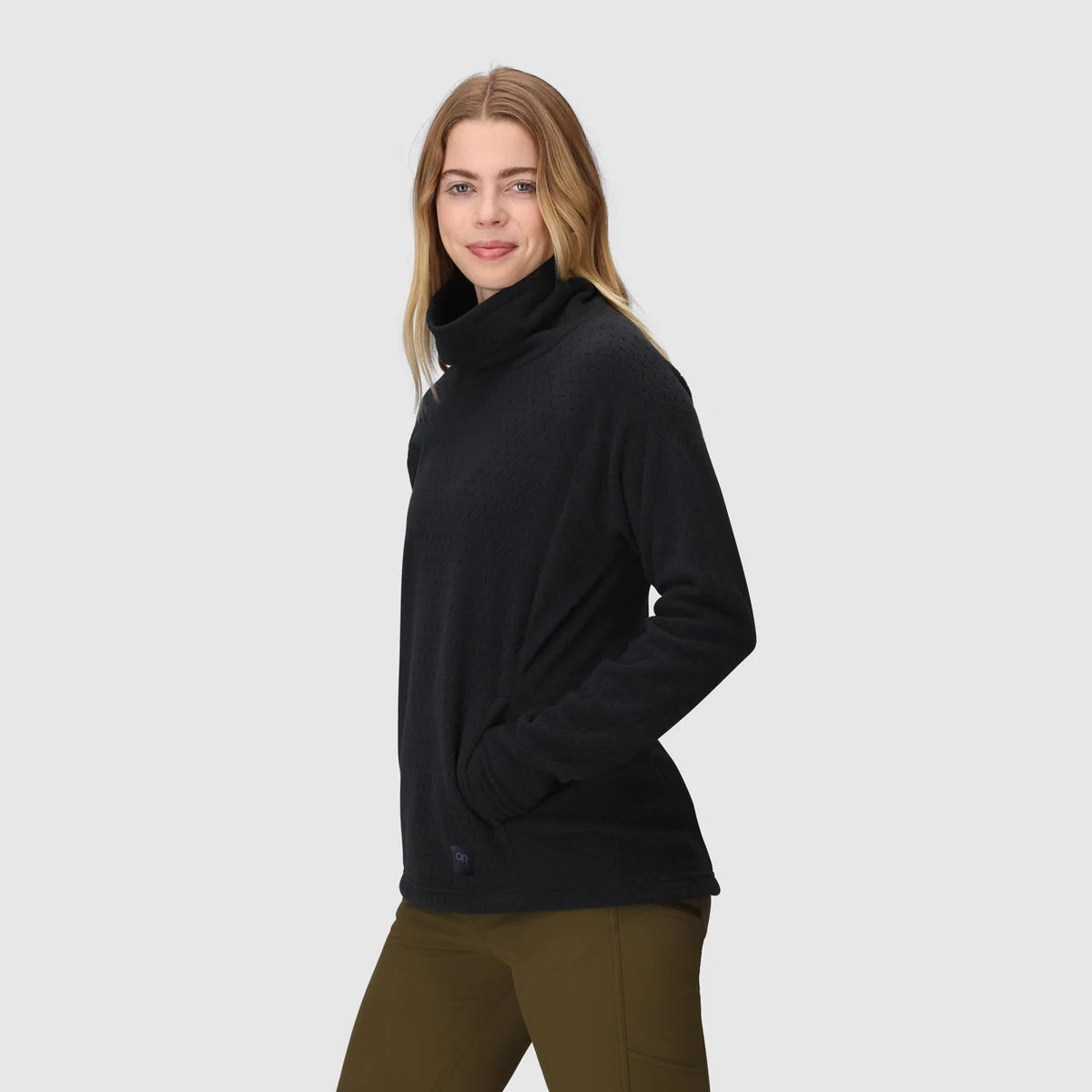 Black fleece cowl pullover shown from the side, with a front hand pocket