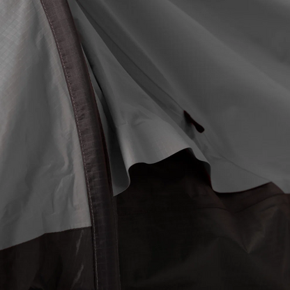 Gray bivy shelter close-up of the inner fabric and curved support pole