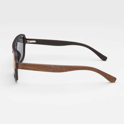 Walnut wood sunglasses profile view with dark gray lenses and tapered temples