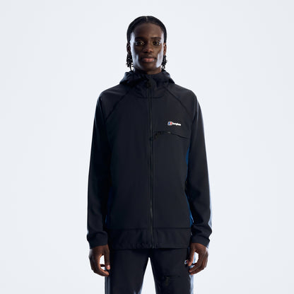 Person wearing a black jacket with a brand logo on a white background