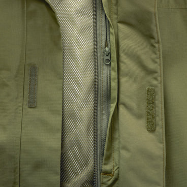 Close-up of waterproof jacket front zip, mesh-lined panel, and logo patch