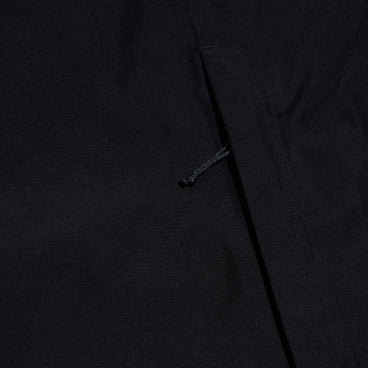 Men's black waterproof jacket, angled seam and front zipper pull