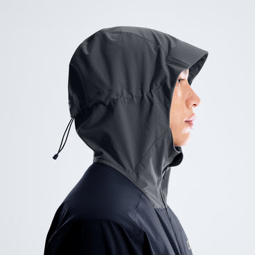 Black hooded jacket with high collar and adjustable drawstring hood