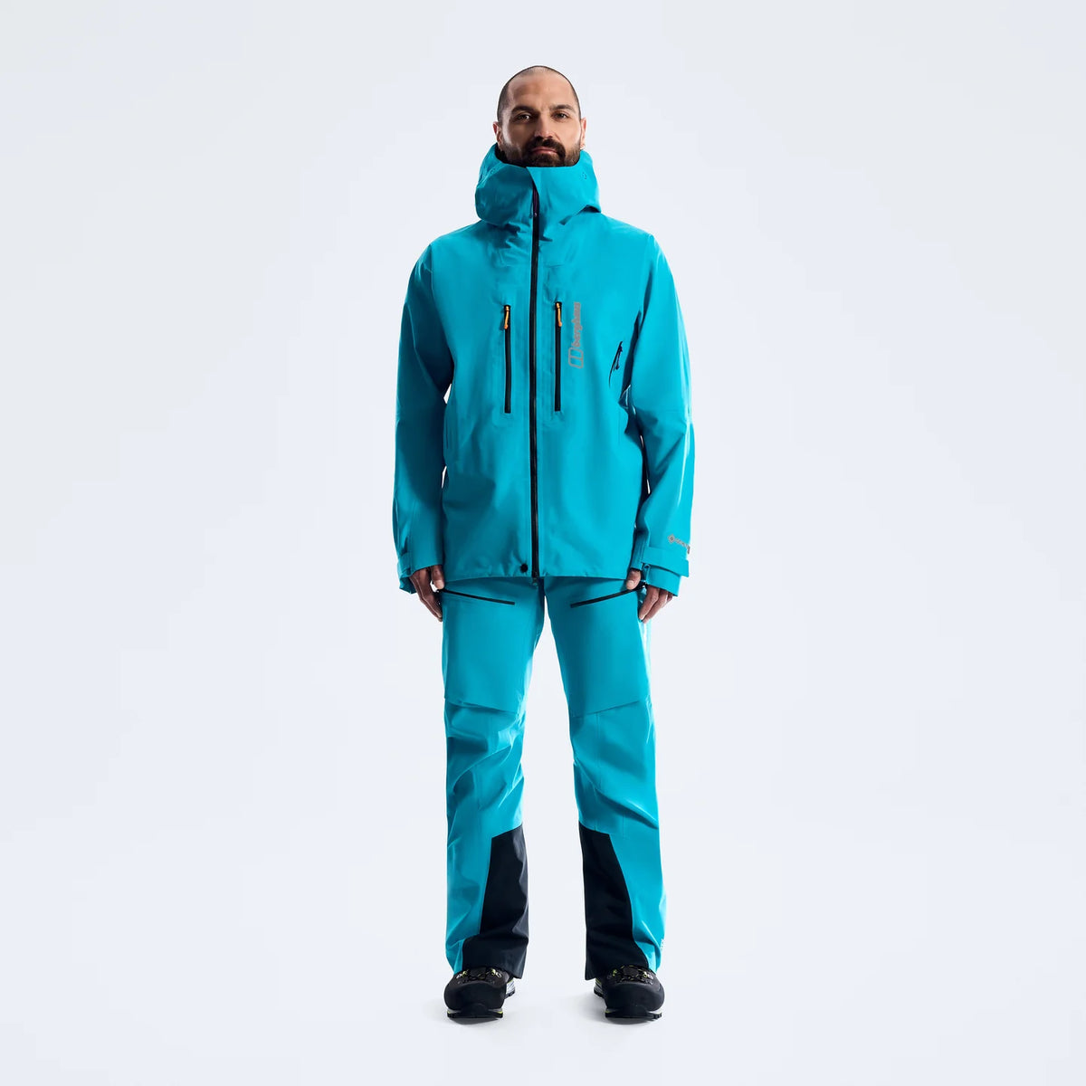 Men's blue waterproof jacket with hood, front zipper, and two chest pocket zips