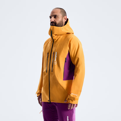 Orange hooded waterproof jacket side view with black center zip and purple panel